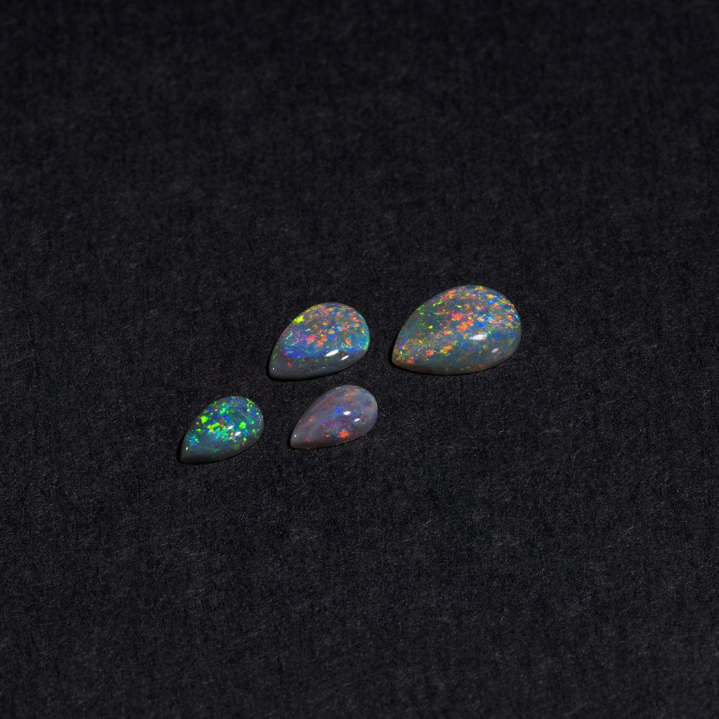 Lightning Ridge black opal pears with full-spectrum multi-color play-of-color